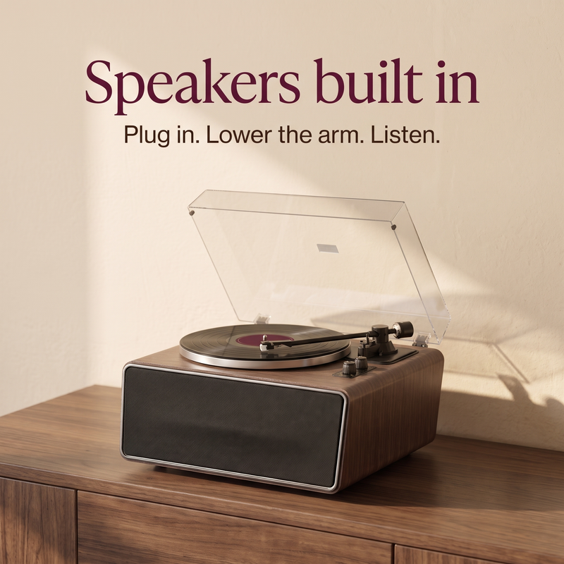 Speakers built in — plug in, lower the arm, listen