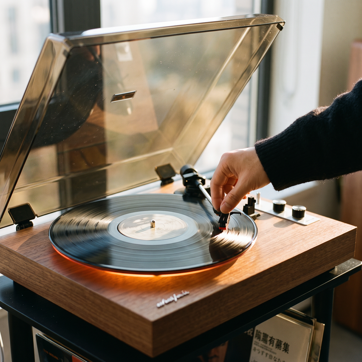 Lowering the tonearm on the Heirloom Loft